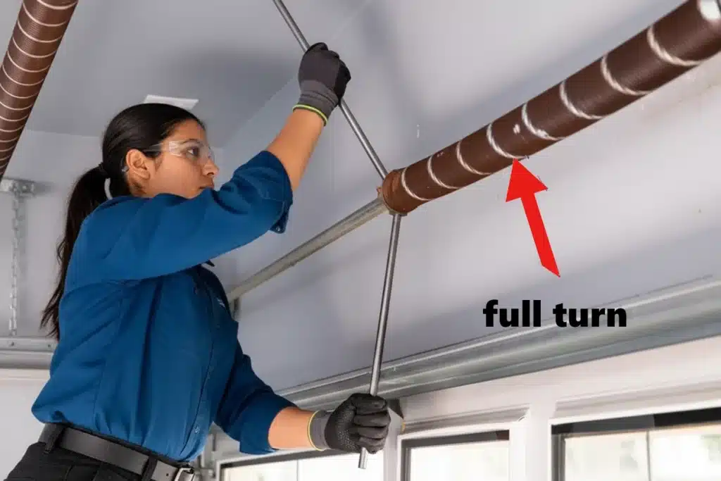 Using a winding stripe to accurately count turns on a garage door torsion spring