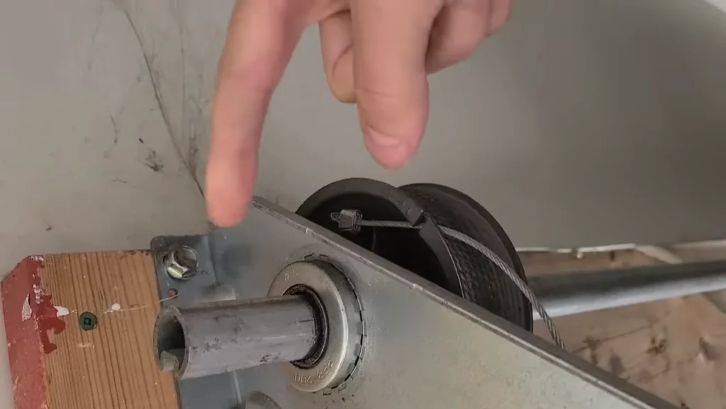 Cable Out of the Drum Showing a cable that has popped out of its groove on the drum